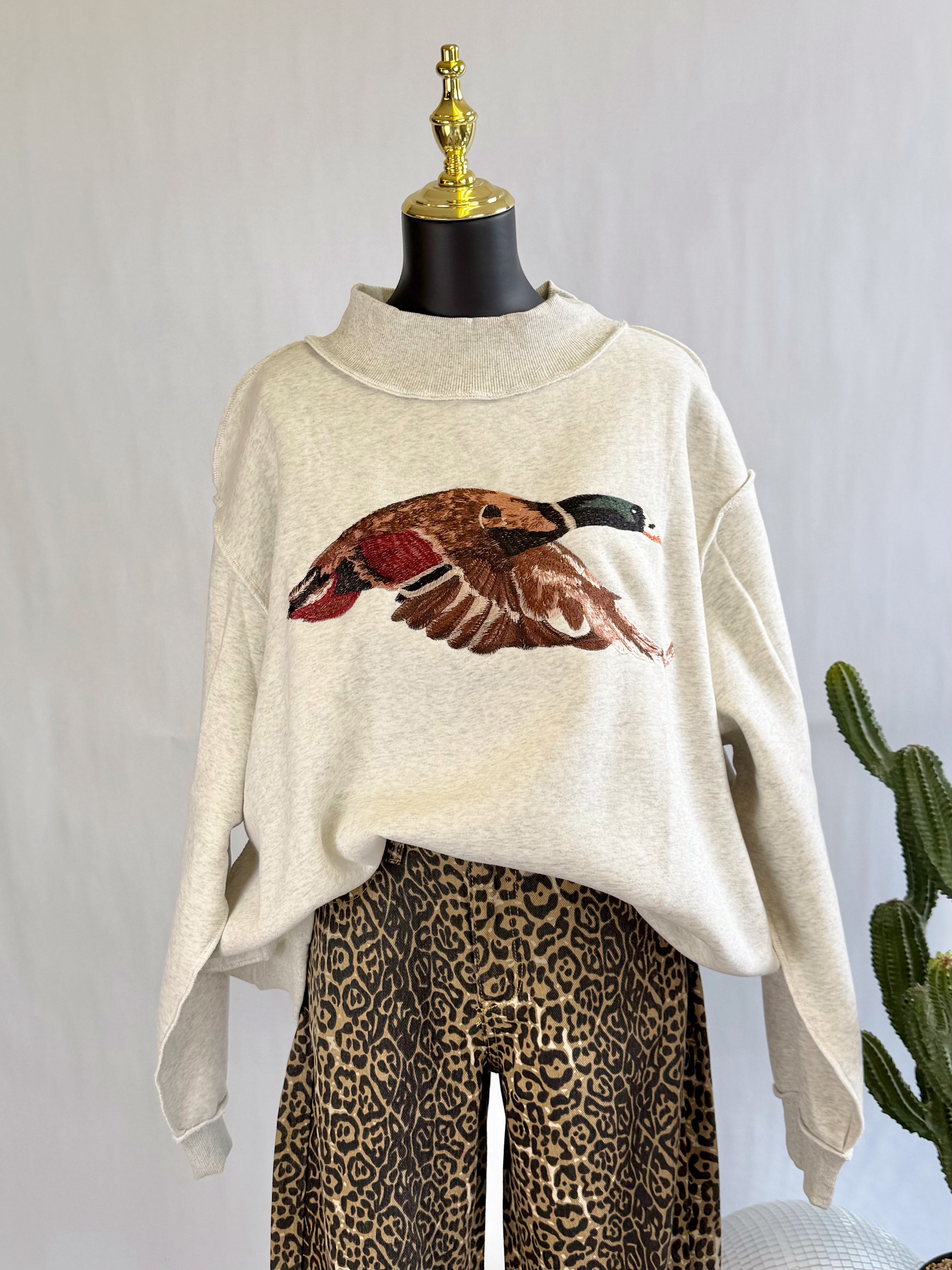 The Duck Creek Mock Neck Sweatshirt