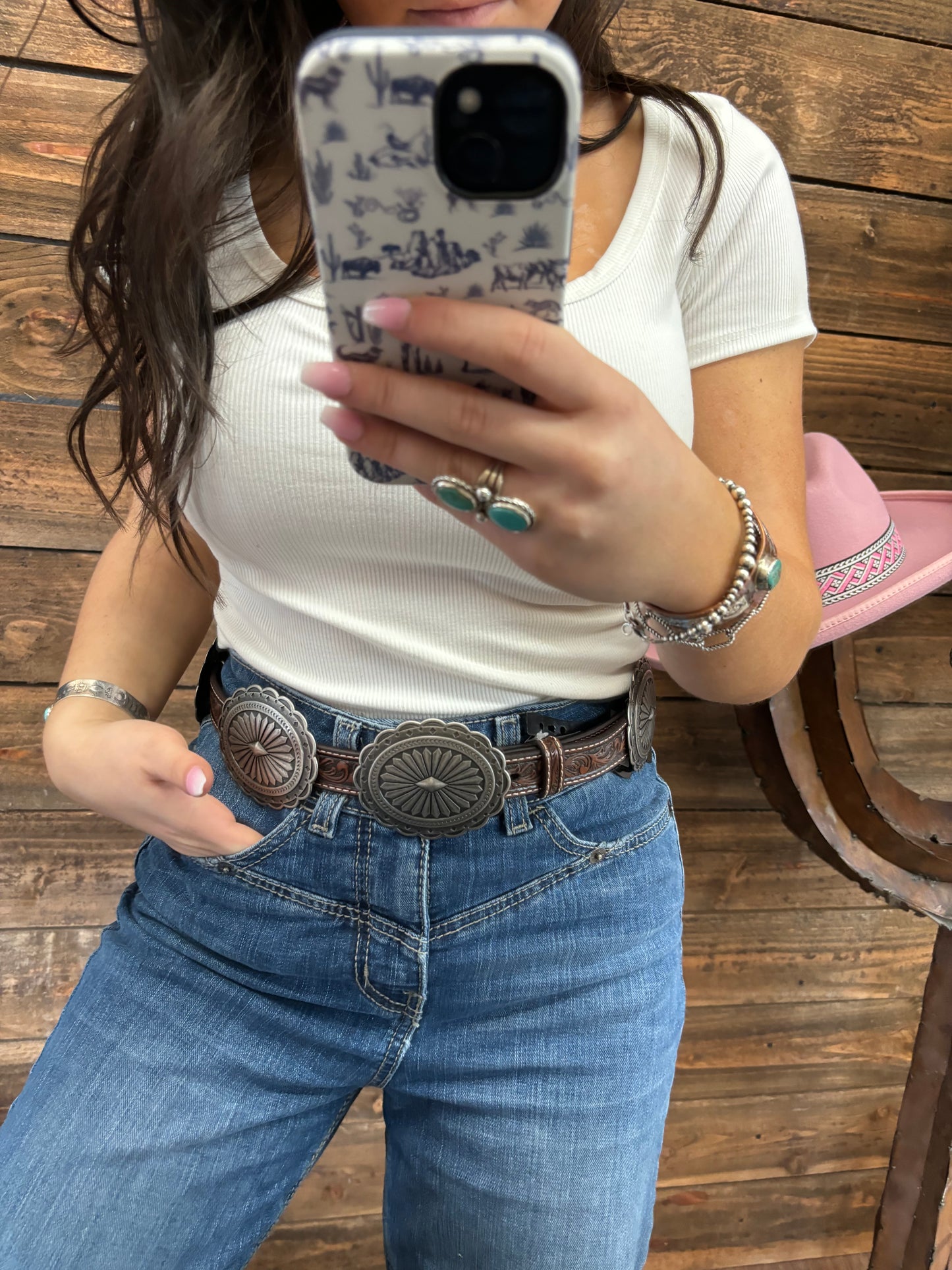 The Ariat Oval Tooled Concho Belt