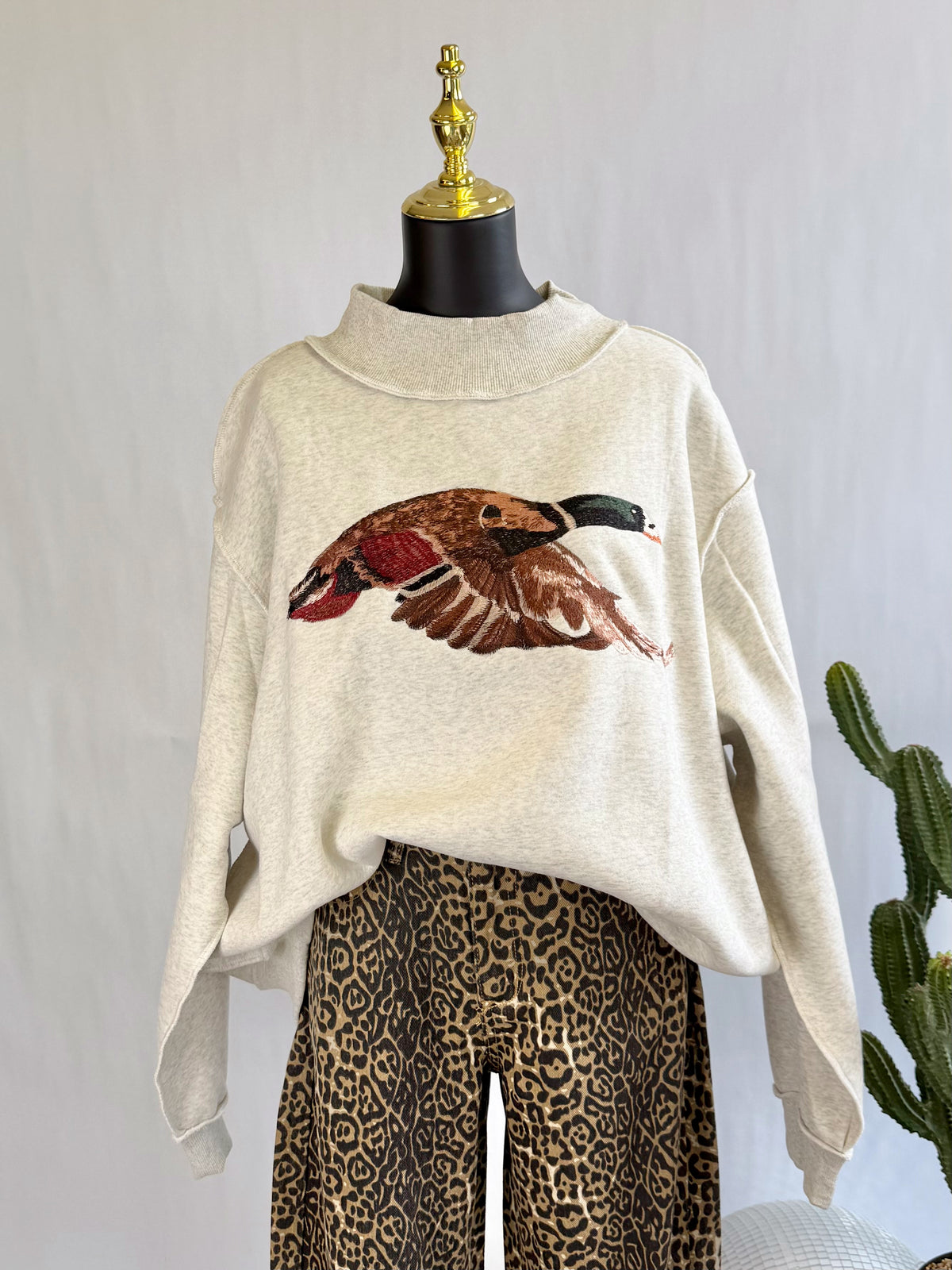 The Duck Creek Mock Neck Sweatshirt