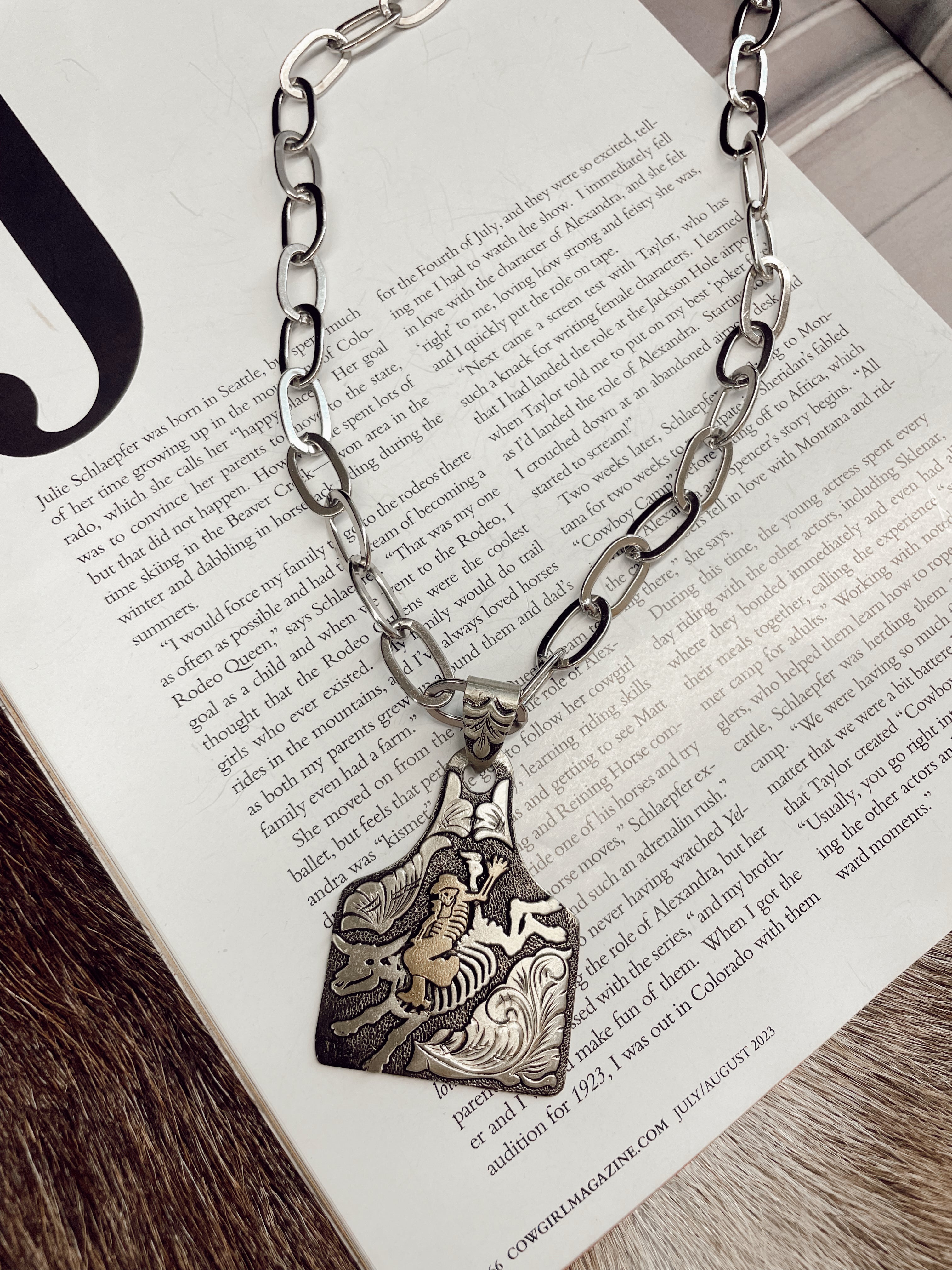 The Silver Striker Skeleton Bullrider Necklace