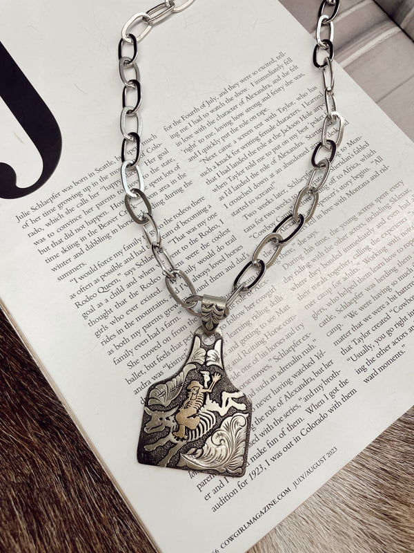 The Silver Striker Skeleton Bullrider Necklace