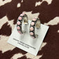 The Pink Conch Huggie Earrings